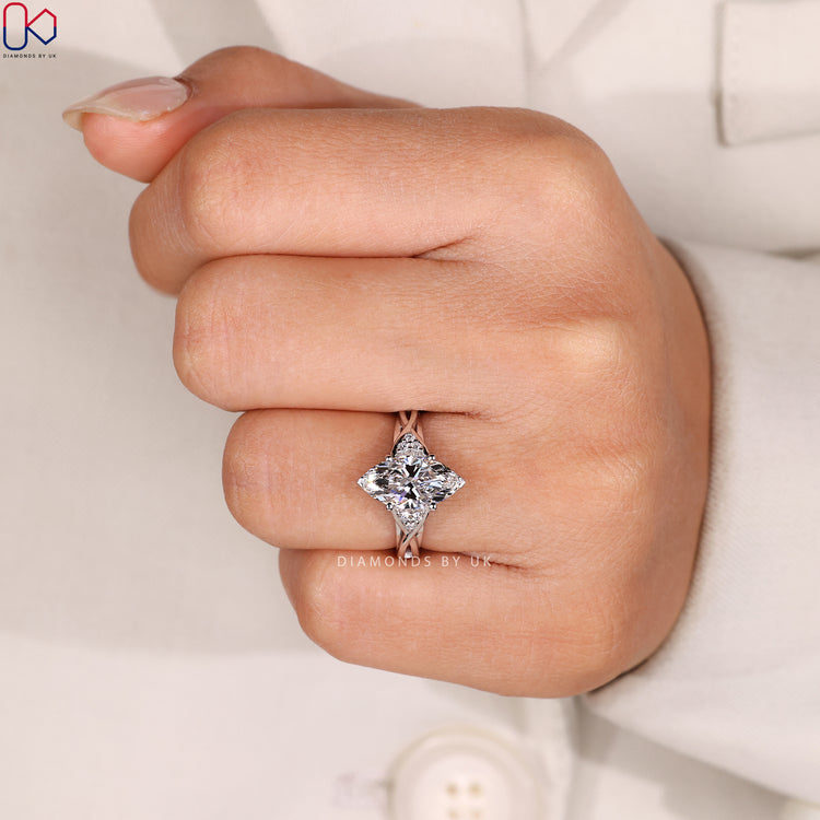Muse setting marquise ring with cathedral style.
