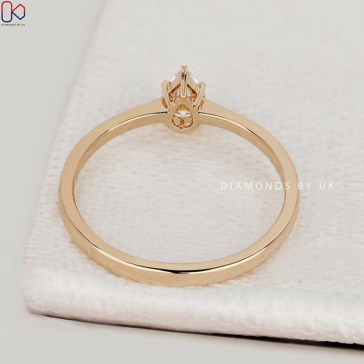 IGI Certified pear cut engagement ring design.