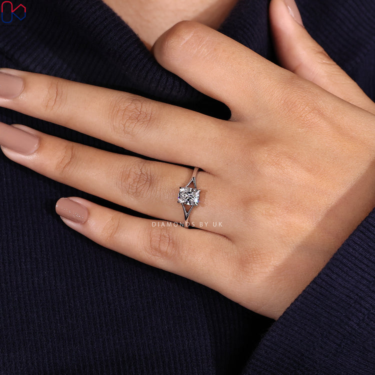 Cushion cut ring with elegant split shank design.