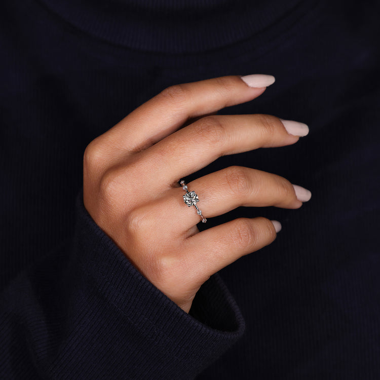 Round engagement ring with secure prong setting.