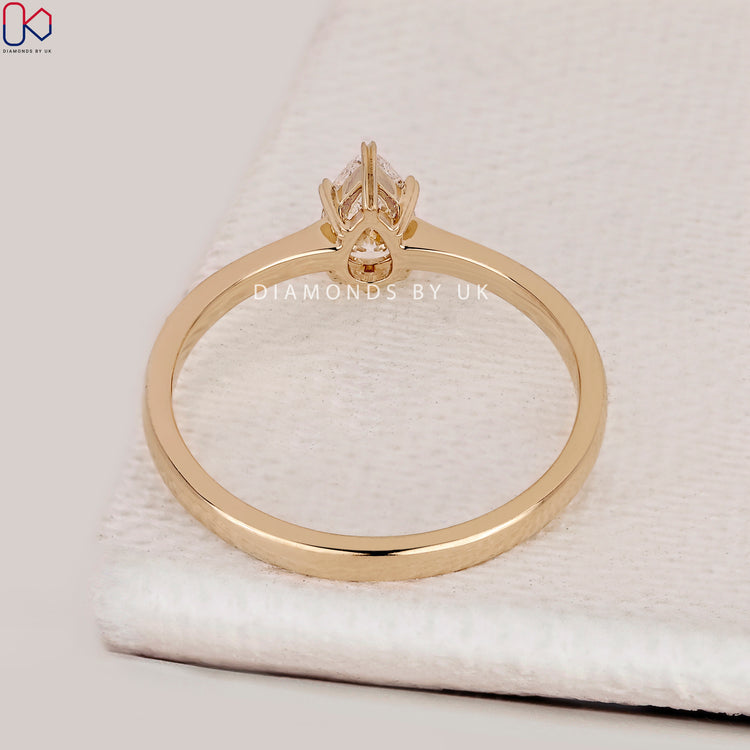 IGI Certified pear cut diamond engagement ring.