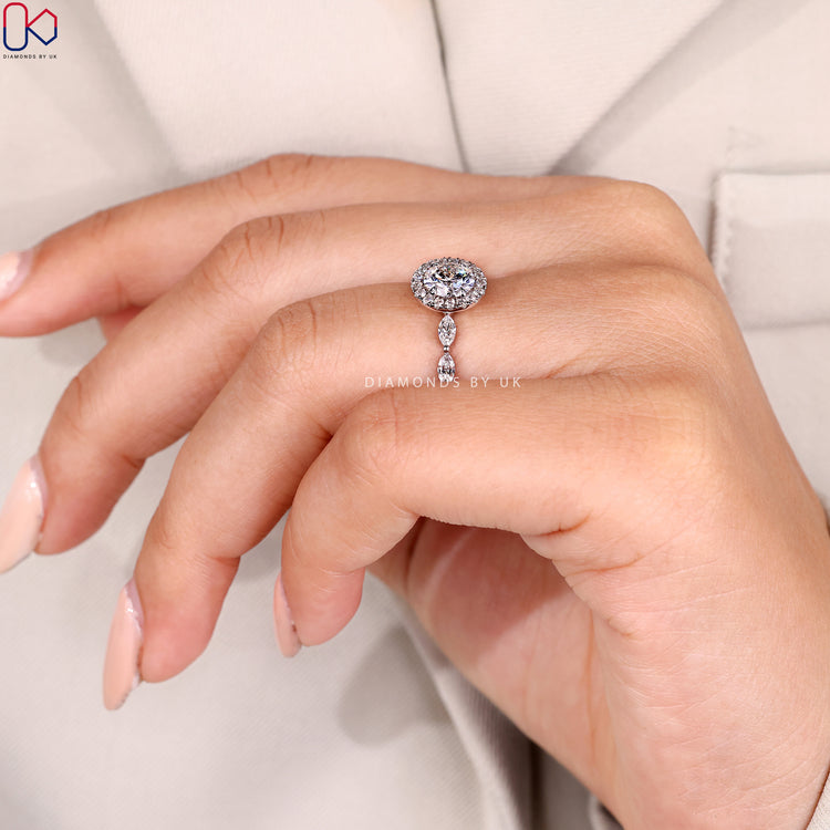 Lab grown round cut ring with marquise pavé.
