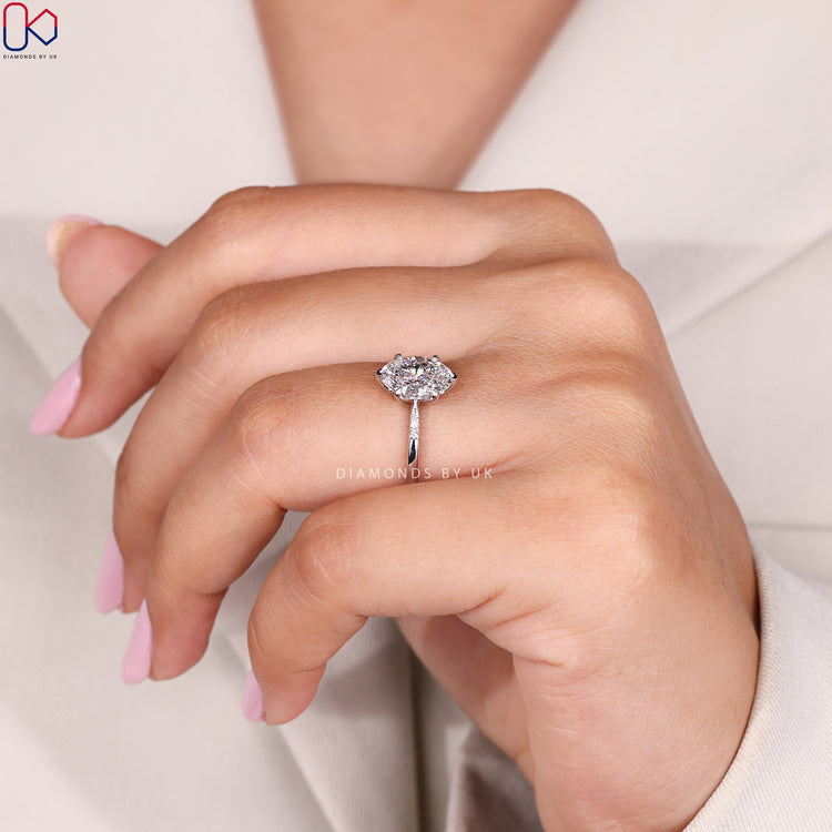 Lab grown oval ring with tapered shank design.
