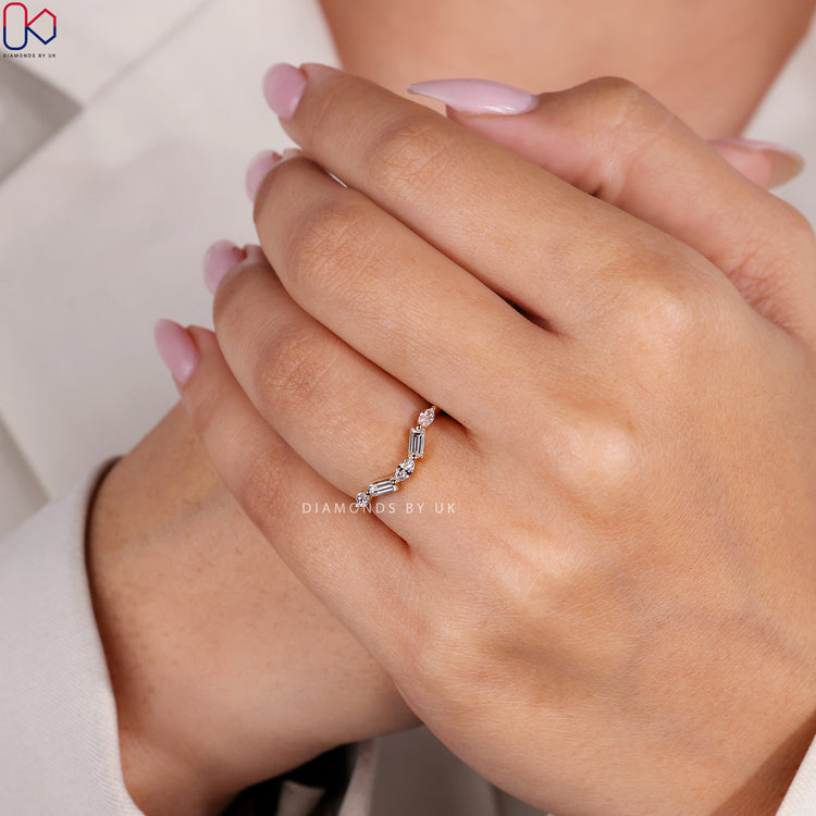 Marquise diamond band with round cut wedding band.
