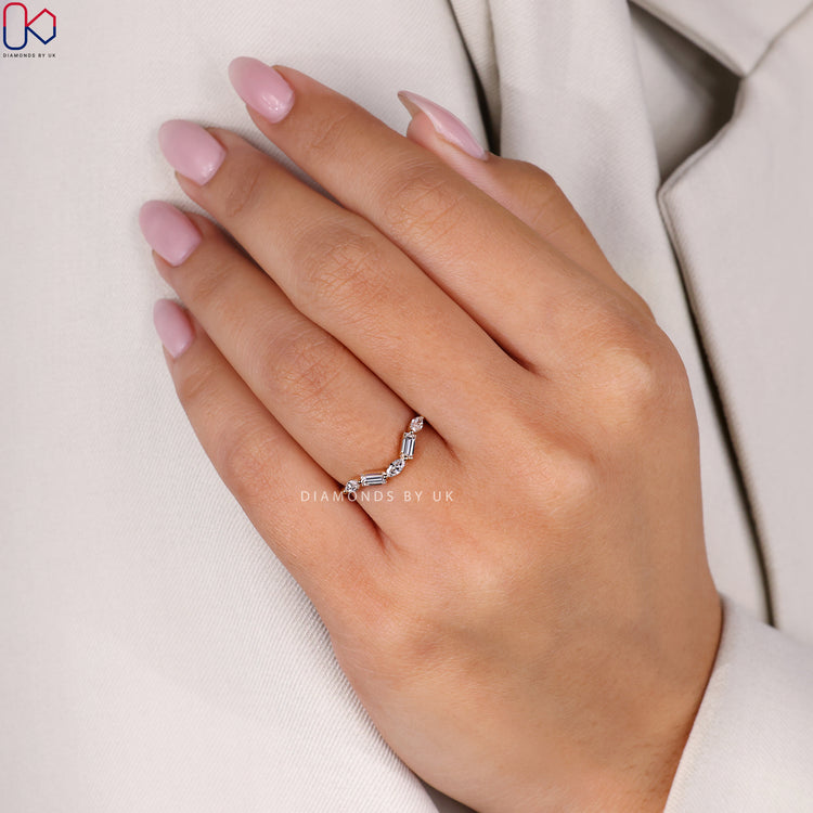 Custom wedding band with marquise and baguette wedding band.
