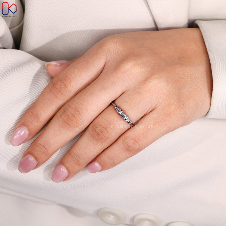 Baguette cut wedding band with tapered side diamonds.
