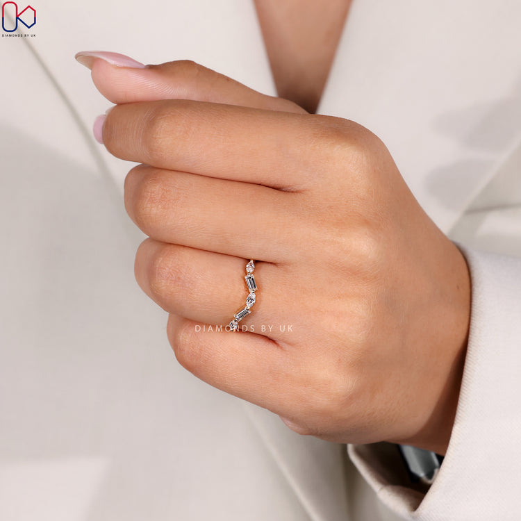 Curvy wedding band from Diamondsbyuk wedding band.
