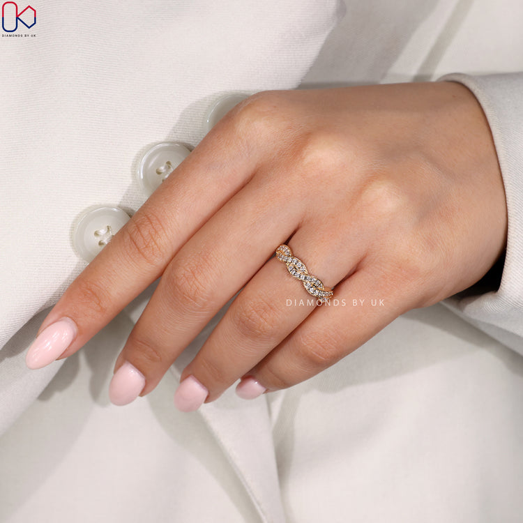 Diamondsbyuk wedding band in yellow gold half eternity style.
