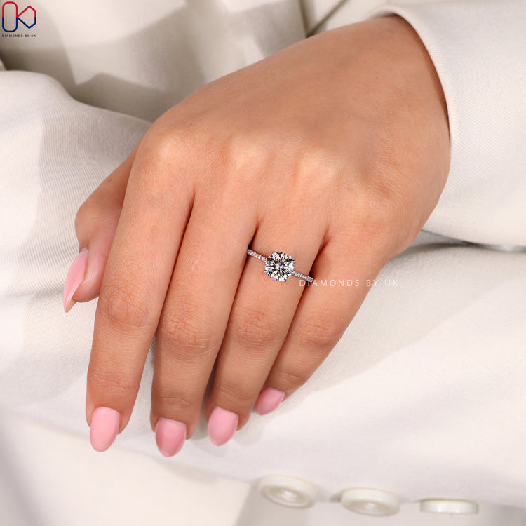 Handmade ring with round cut diamonds.
