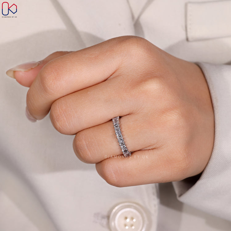 Handmade band with princess and baguette diamonds.
