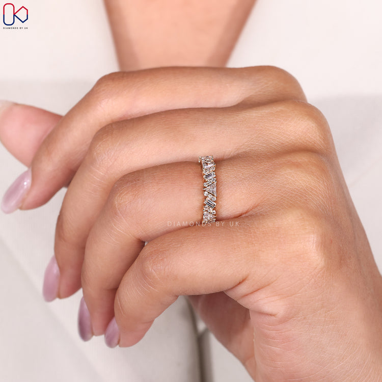 Yellow gold wedding band with mixed diamond cuts.
