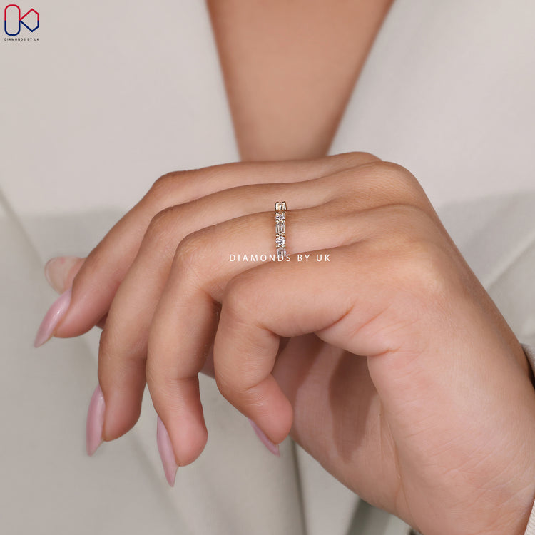 Custom diamond band handcrafted in yellow gold.
