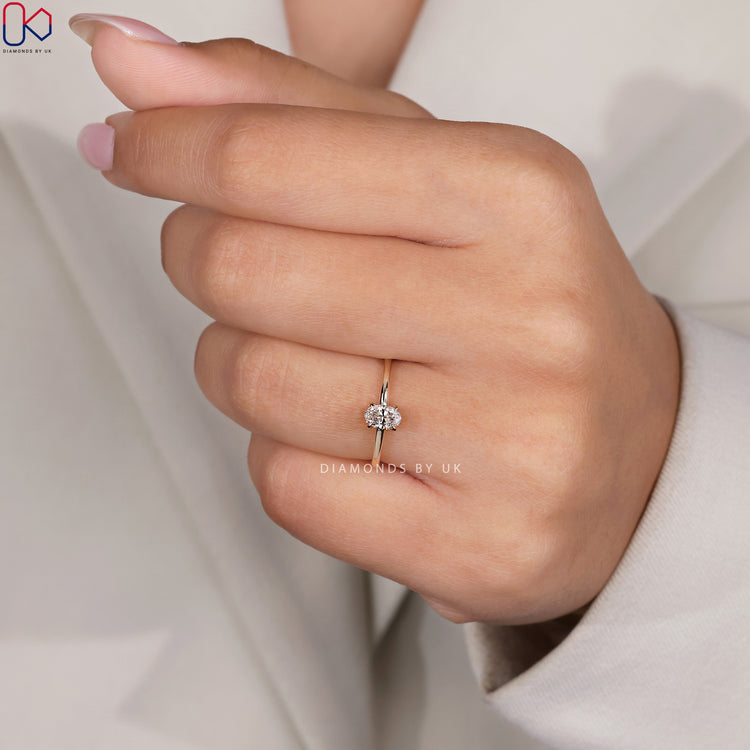 Oval cut diamond ring with a classic design.
