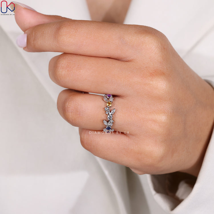 Amethyst sapphire diamond band in white gold.
