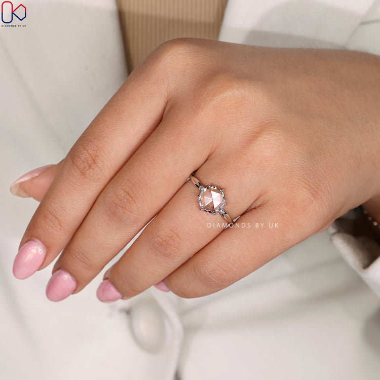 Handmade white gold three stone engagement ring.
