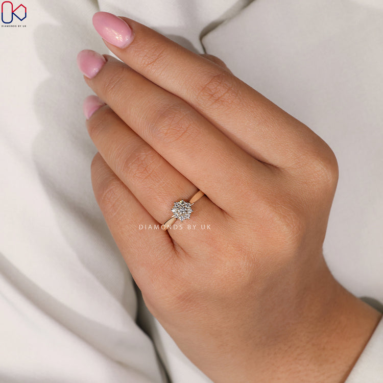 Handmade ring featuring a cluster halo diamond setting.
