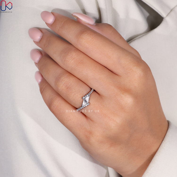 Diamondsbyuk wedding band made with lab grown diamonds in prong setting.
