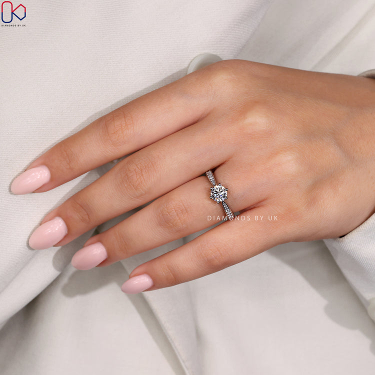 White gold handmade ring with a tapered shank.
