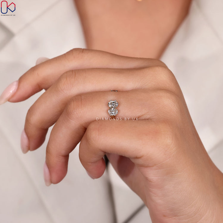 Custom wedding band made as four stone band.
