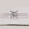 Princess cut engagement ring in white gold.
