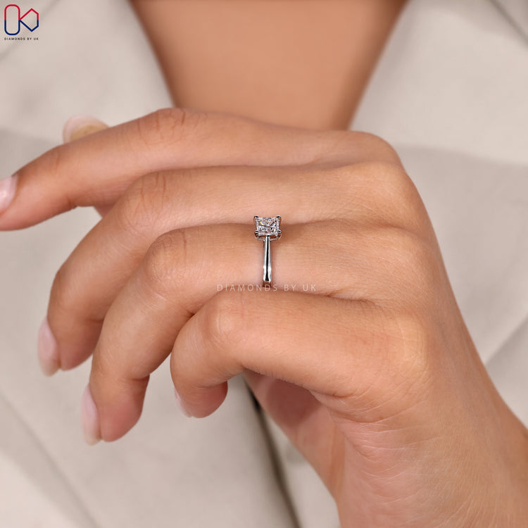 White gold diamond ring with four prong setting.
