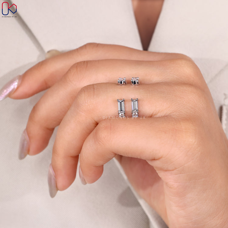 White gold wedding band with shared prong setting.
