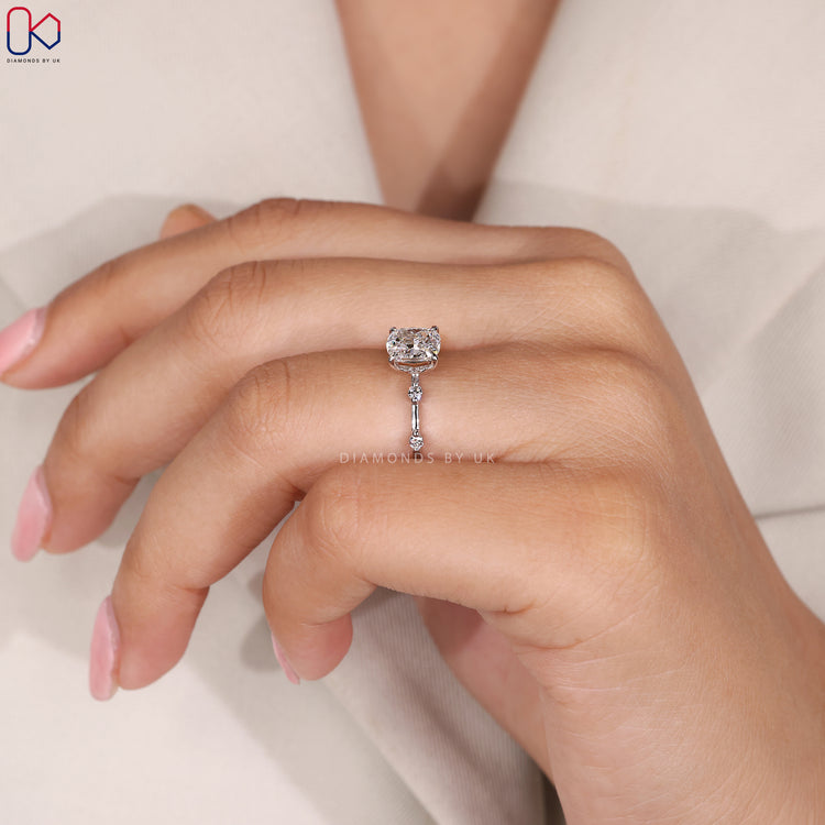 White gold diamond ring with cushion cut design.
