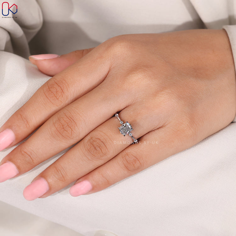 Handmade four claw prong cushion diamond ring.
