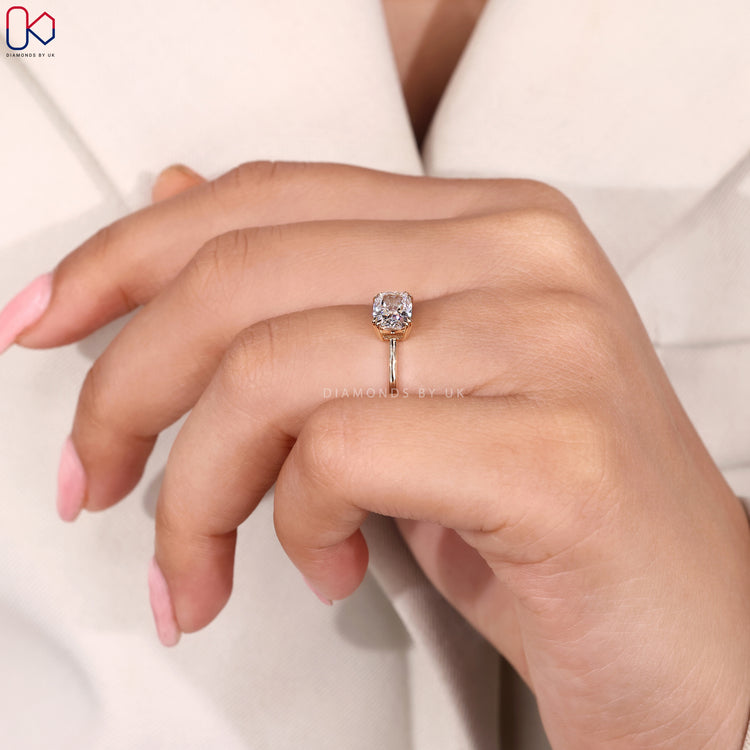 Double claw prong setting radiant cut engagement ring.
