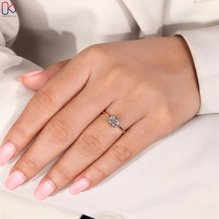 Handmade yellow gold solitaire engagement ring.
