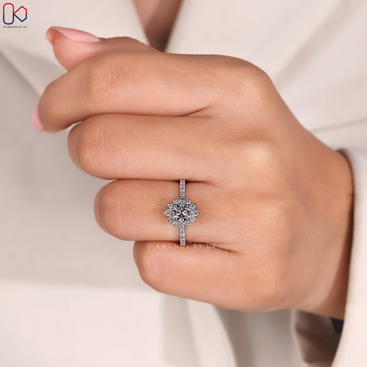 Round cut pave band ring with diamond accents.
