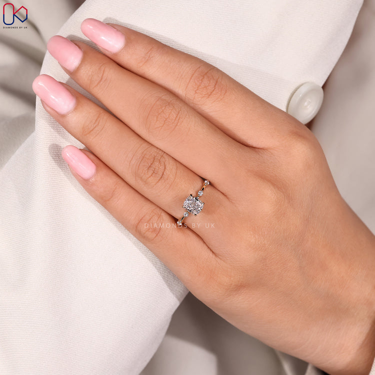 Diamondsbyuk yellow gold cushion engagement ring.

