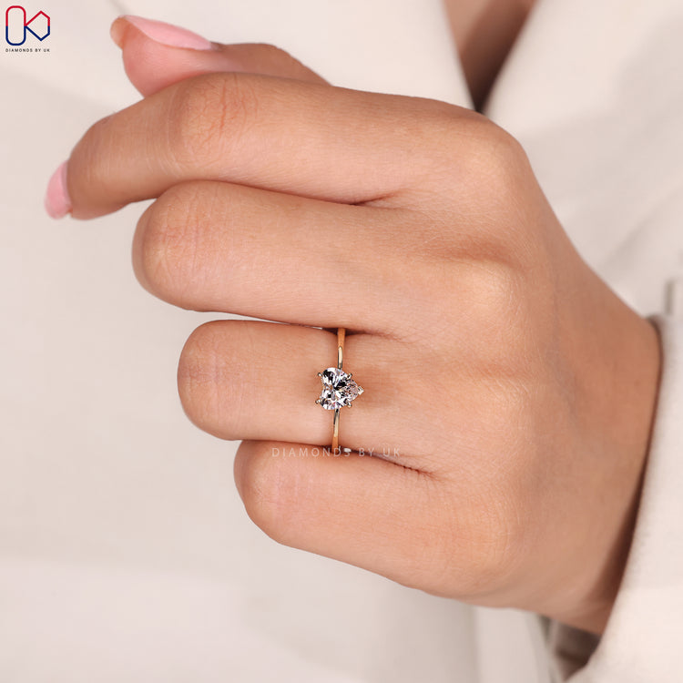 Handmade yellow gold solitaire engagement ring.
