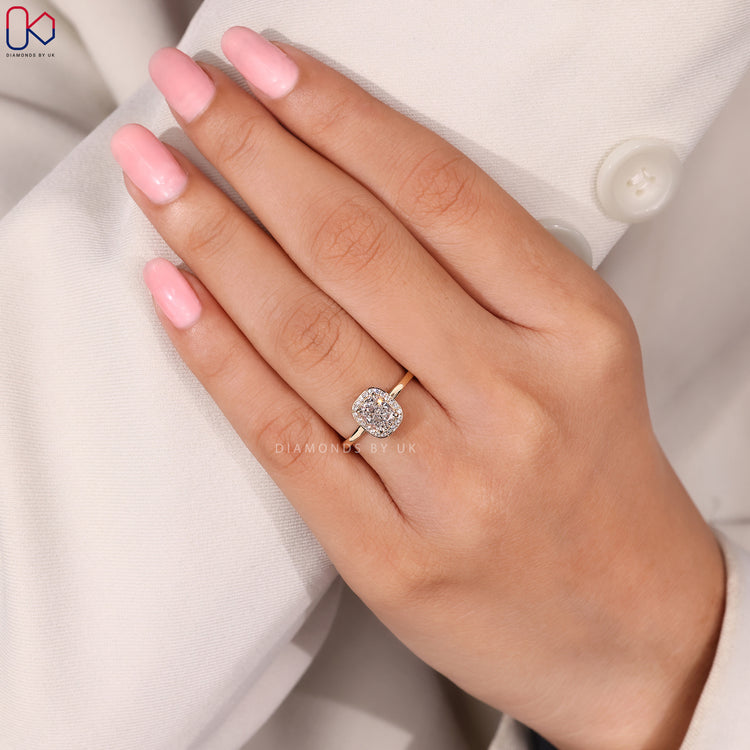 Handmade yellow gold halo engagement ring.
