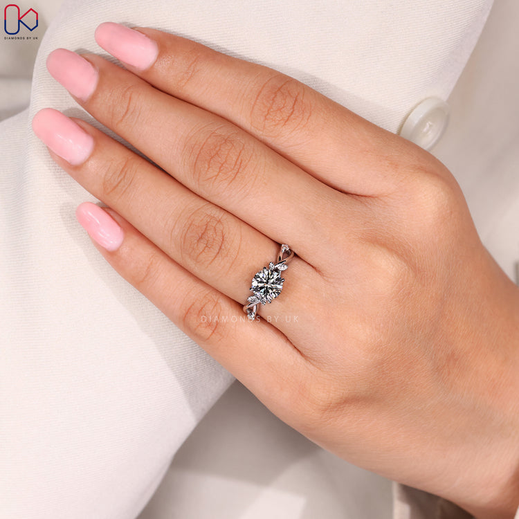 Cluster diamond ring with round cut diamonds.
