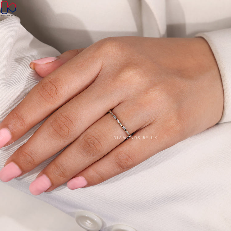 Half eternity band with yellow gold wedding band.
