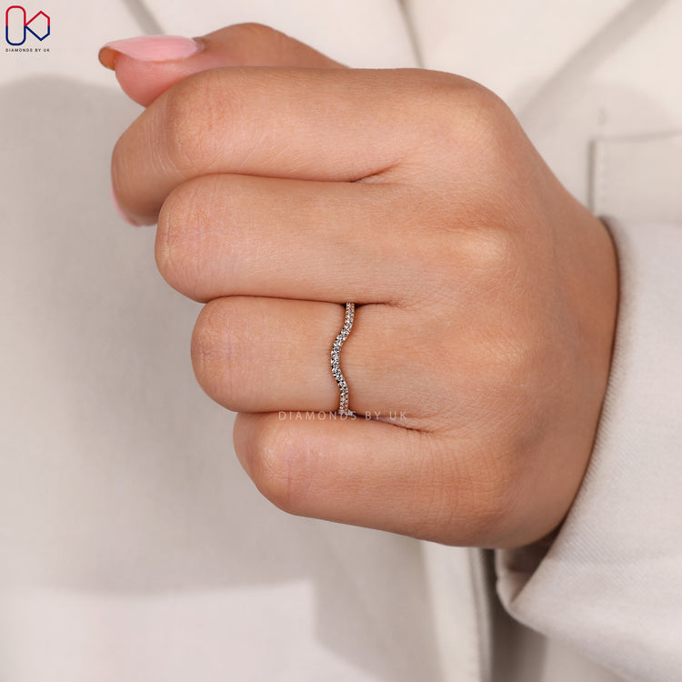 Custom diamond band with chevron shape.
