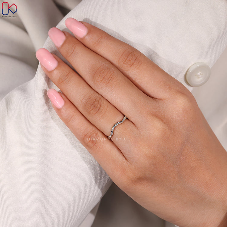 Handmade jewellery curved diamond band.
