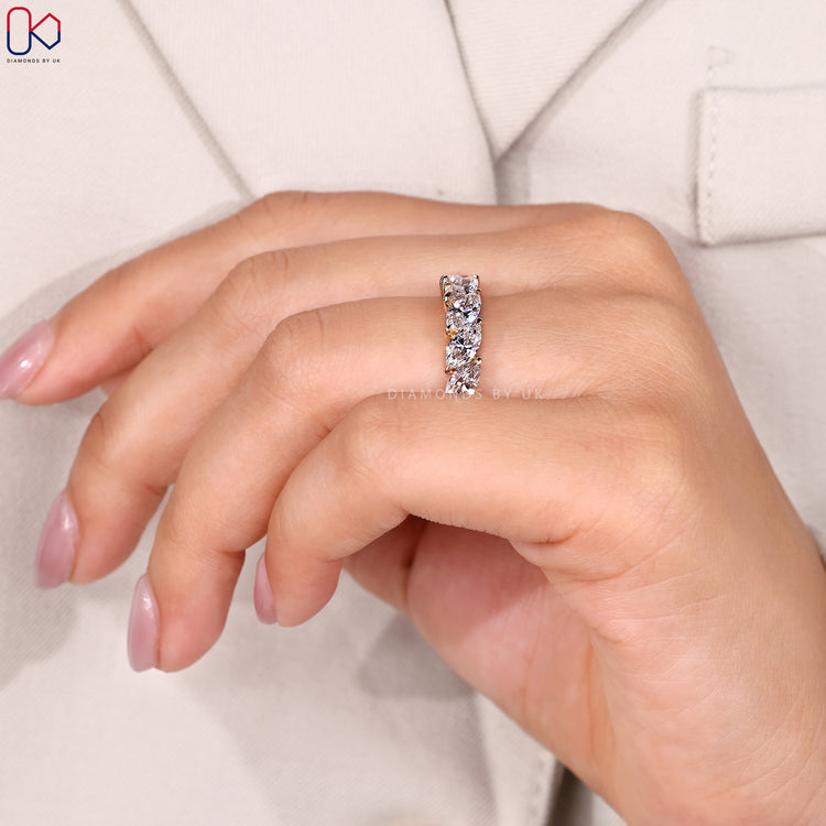 Custom diamond band with marquise stones.
