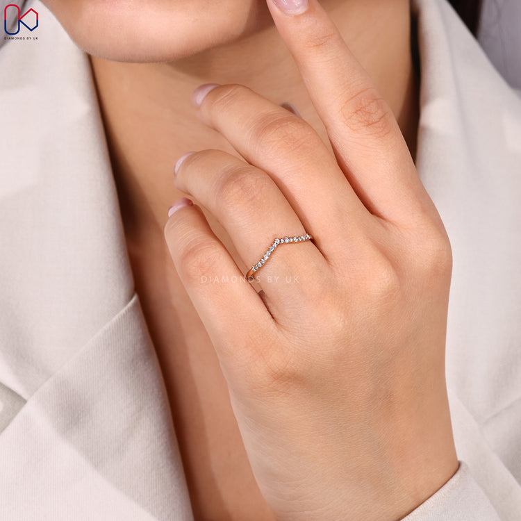 Handmade band with round diamonds.
