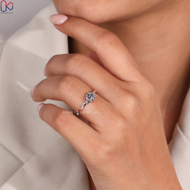 DiamondsbyUK white gold Asscher cut diamond ring.
