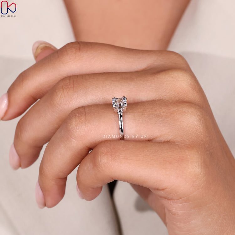 Handmade three stone diamond ring in white gold.
