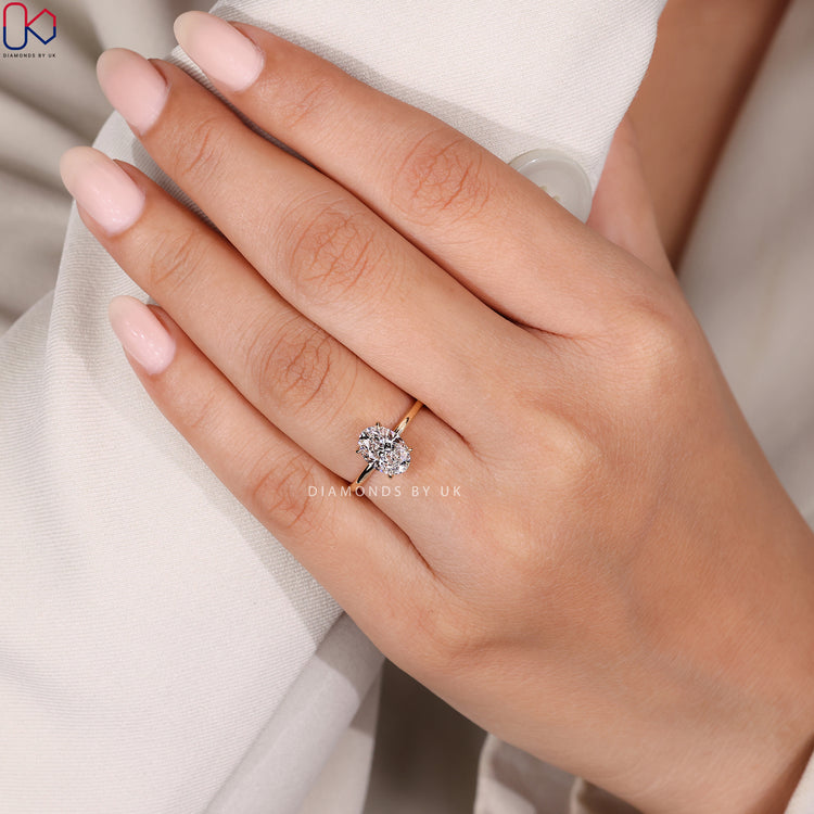 Top view of oval diamond in claw setting.
