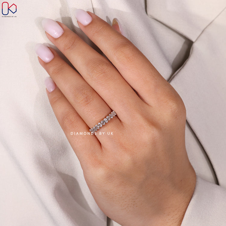 Handmade oval diamond band by Diamondsbyuk.
