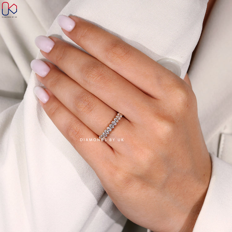 Buy oval diamond half eternity band in yellow gold.
