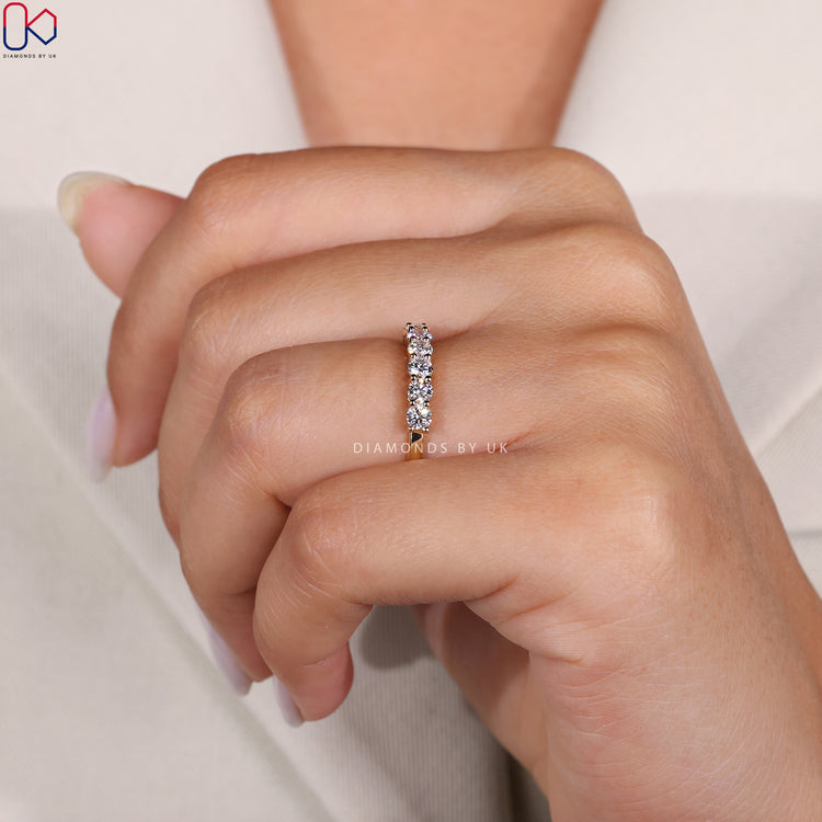 Custom wedding band with round diamond band.
