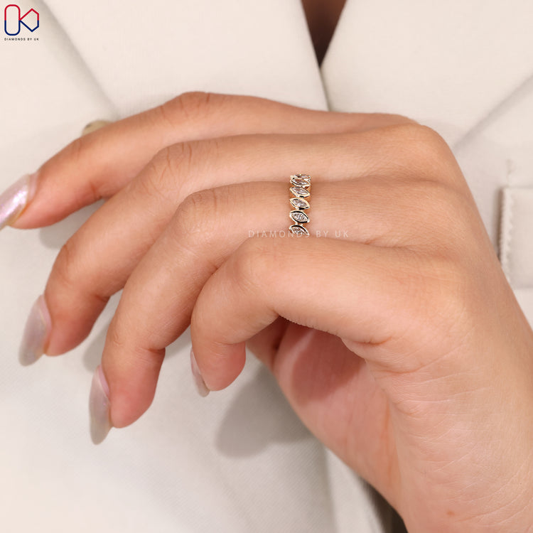 Diamondsbyuk yellow gold half eternity diamond band.
