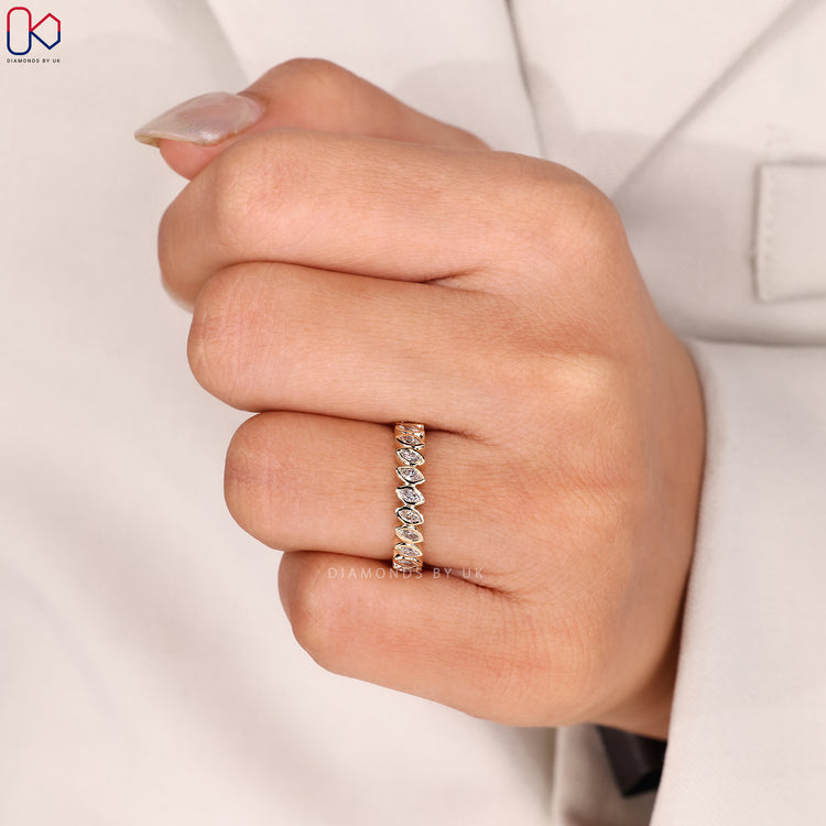 Stackable marquise diamond band in yellow gold.
