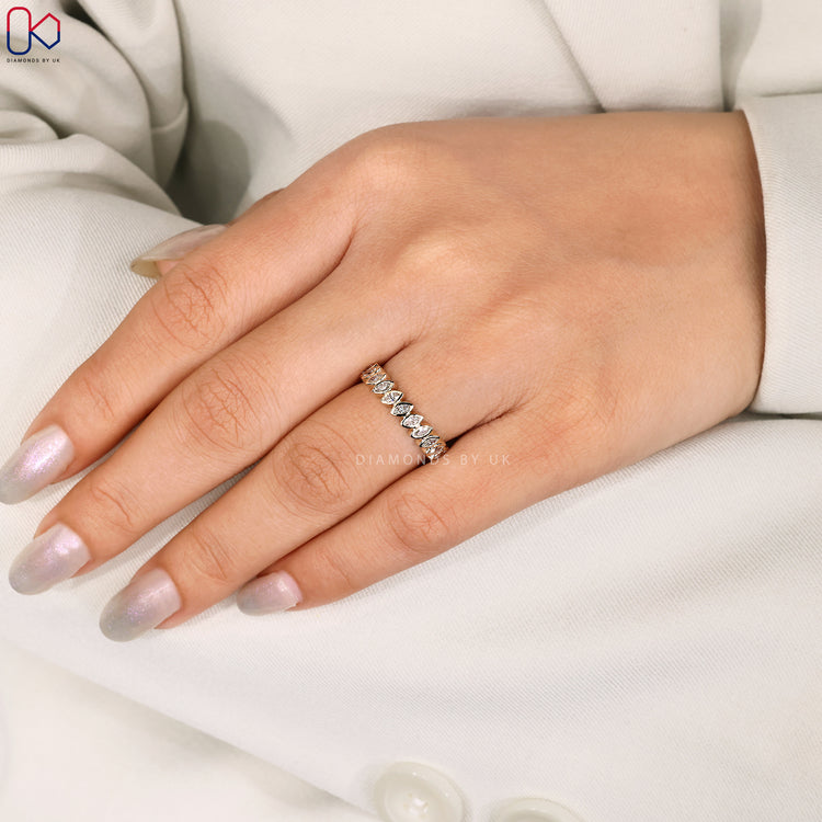 Custom yellow gold half eternity diamond wedding band.
