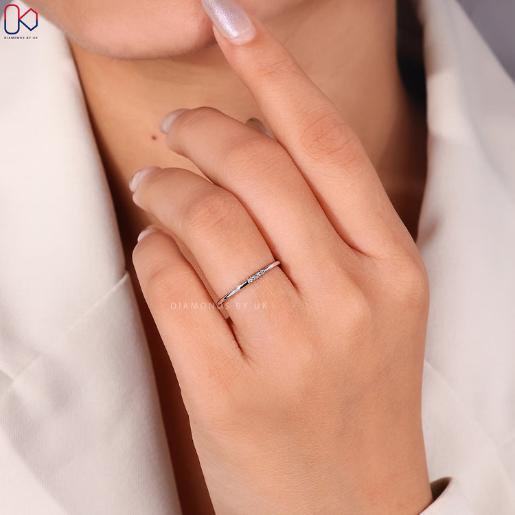 Diamondsbyuk wedding band in white gold.
